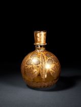 A MUGHAL GLIT DECORATED GLASS HUQQA BASE, LUCKNOW, 18TH CENTURY