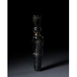 A BLACK GLASS FATIMID COSMETIC VASE, 9TH CENTURY, EGYPT