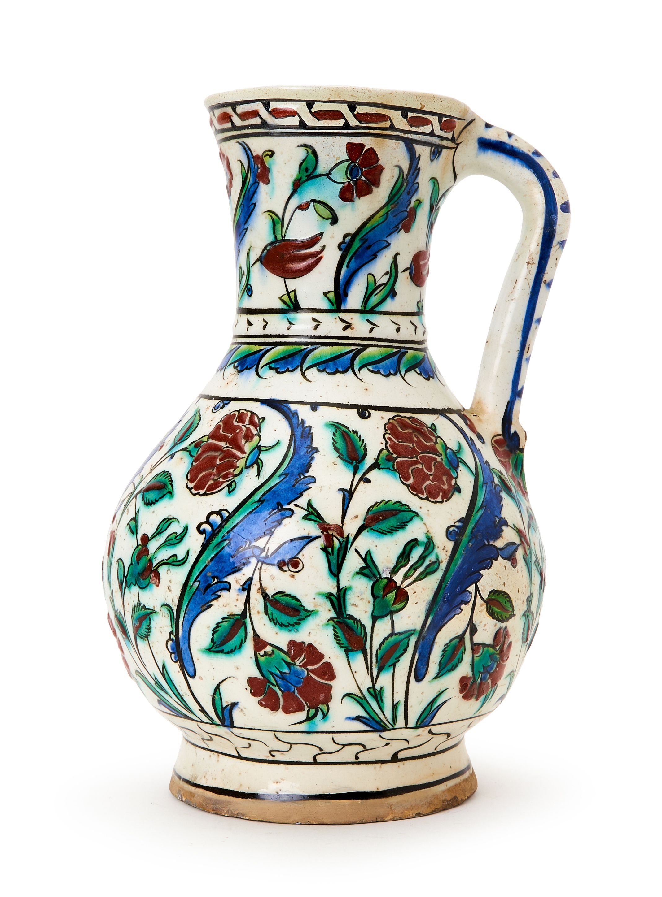 A LARGE IZNIK POTTERY JUG OTTOMAN TURKEY, 17TH CENTURY