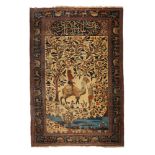 AN UNUSUAL ALI AKBARI KASHAN RUG DEPICTING COMPOSITE CAMEL "TREE OF LIFE" SIGNED MIRZA ALI AKBAR NAK