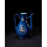 A BLUE-GLAZED AND SLIP-DECORATED EWER LATE MING DYNASTY (1368-1644)