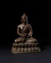 A BRONZE SEATED FIGURE OF SHAKAYAMUNI BUDDHA, 19TH CENTURY