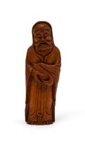 A CHINESE CARVED BAMBOO FIGURE OF A LUOHAN, QING DYNASTY (1644-1911)