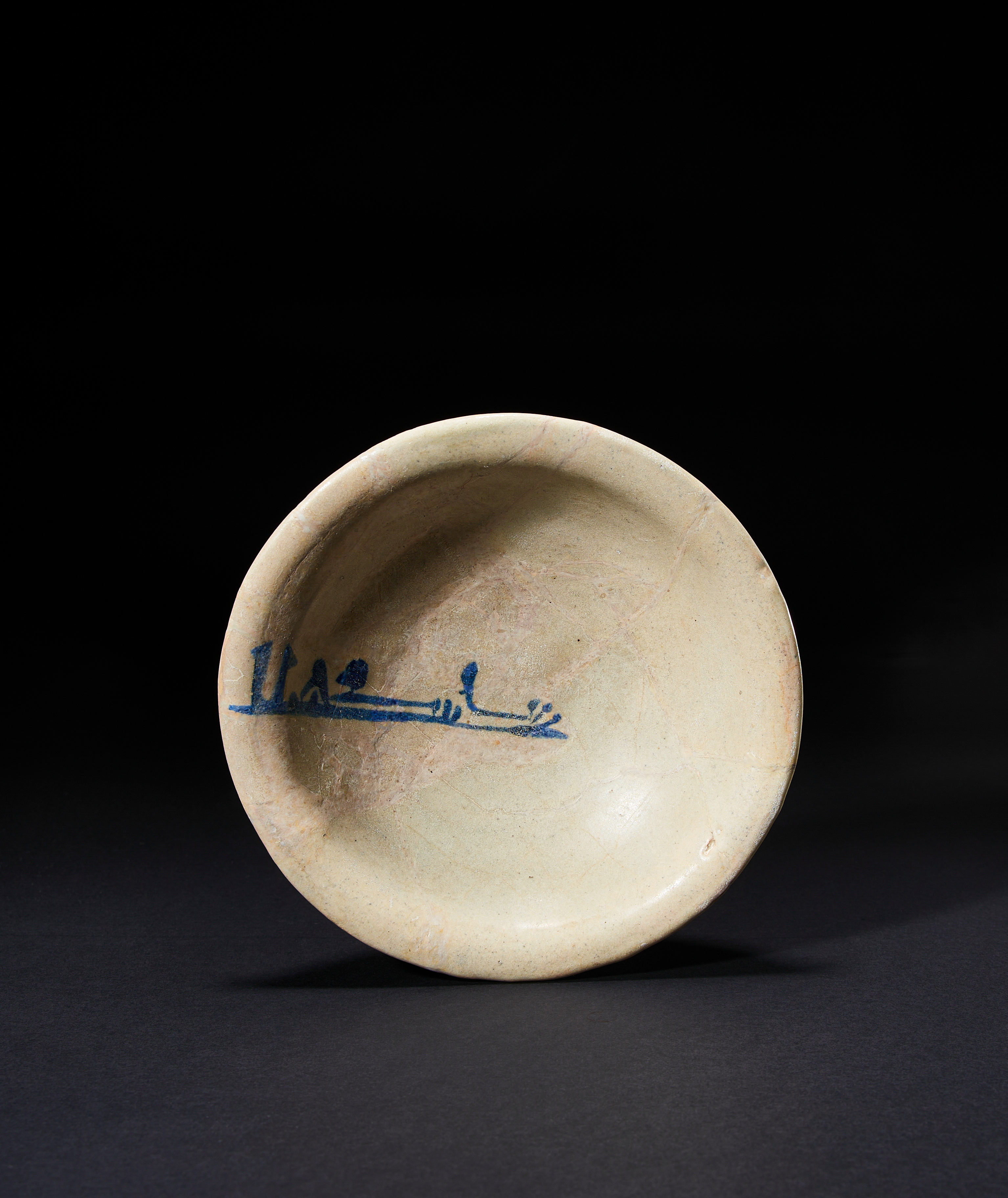 AN ABBASID TIN GLAZED POTTERY BOWL MESOPOTAMIA, 9TH CENTURY