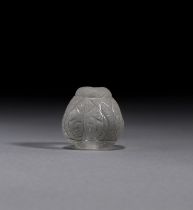 A CARVED FATIMID ROCK CRYSTAL GAME PIECE, CIRCA 9TH CENTURY, EGYPT