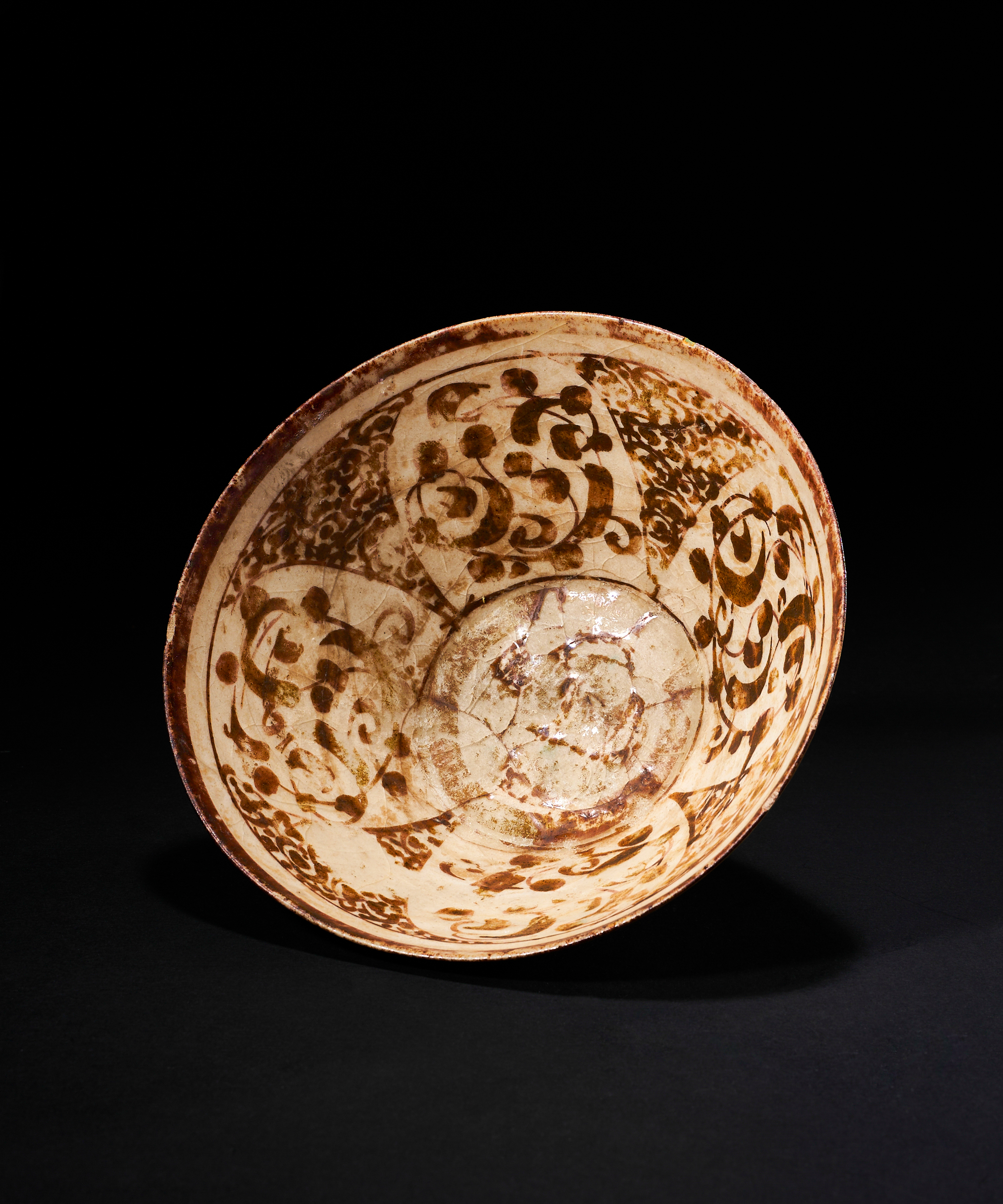 AN ABBASID LUSTRE POTTERY BOWL, CIRCA 10TH CENTURY