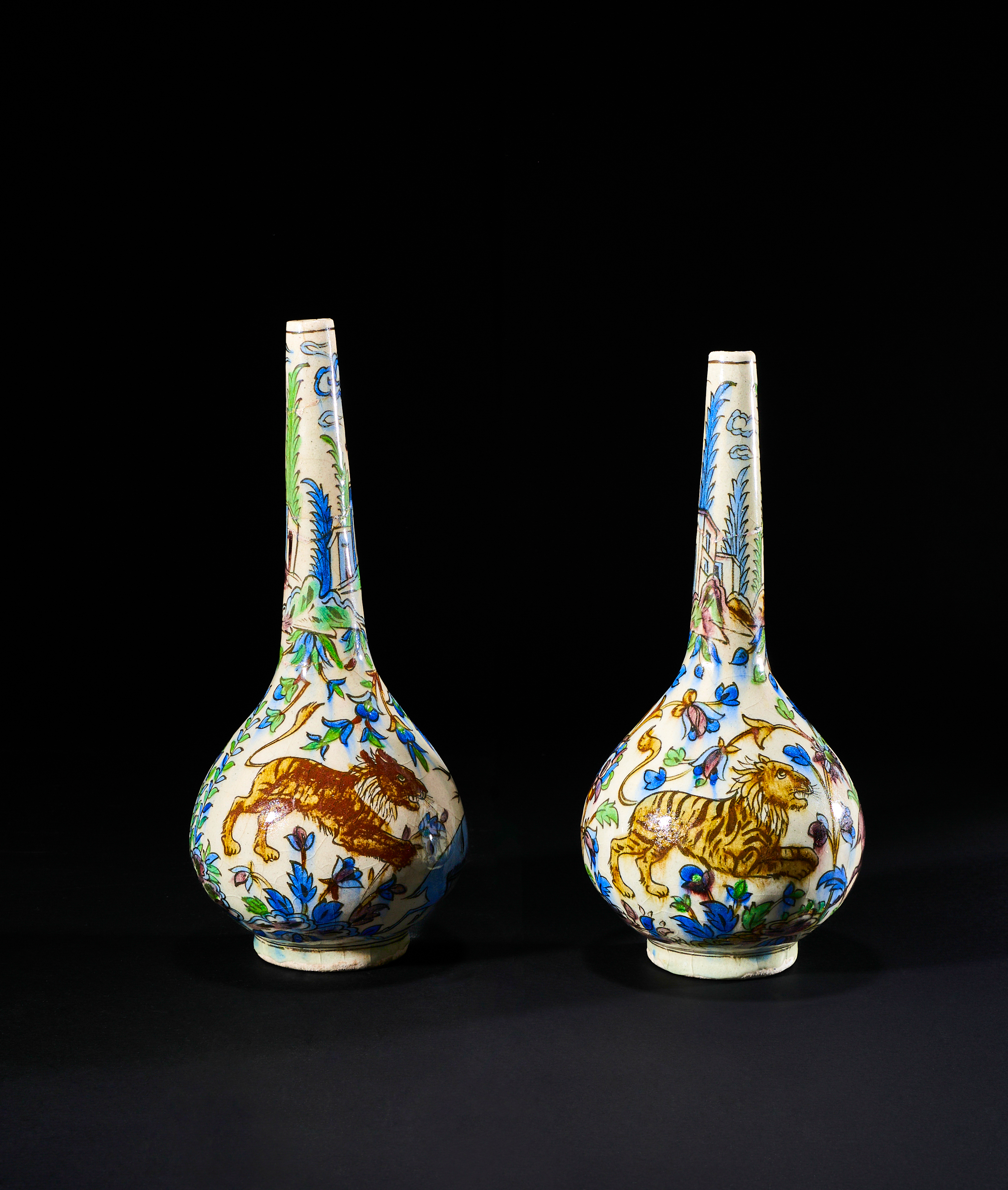 A PAIR OF POLYCHROME QAJAR HUNTING SCENE ROSEWATER SPRINKLER BOTTLE VASES, 19TH CENTURY