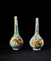 A PAIR OF POLYCHROME QAJAR HUNTING SCENE ROSEWATER SPRINKLER BOTTLE VASES, 19TH CENTURY