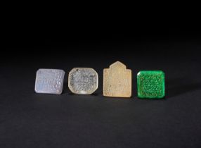 FOUR HARDSTONE TALISMANIC PENDANTS, PERSIA, 19TH CENTURY