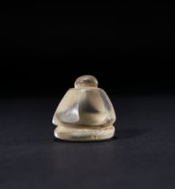 AN ISLAMIC ROCK CRYSTAL GAME PIECE, PROBABLY FATIMID, CIRCA 9TH-11TH CENTURY