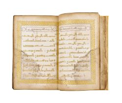 A GOLD KUFIC QURAN, 20TH CENTURY