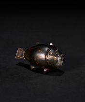 A BLACK CRYSTAL FIGURE OF A FISH, PROBABLY FATIMID