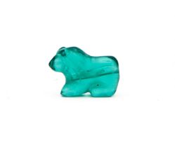 A CARVED GREEN GEMSTONE IN THE FORM OF A FELINE