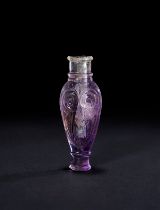 A MUGHAL CARVED AMETHYST COSMETIC BOTTLE, 18TH/19TH CENTURY, INDIA