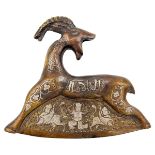 A SELJUK REVIVAL SILVER INLAID BRONZE CHOPPER IN THE FORM OF A RAM, 19TH CENTURY