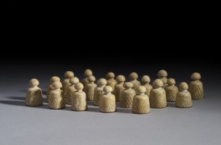 AN ASSORTMENT OF ISLAMIC STONE CHESS PIECES