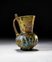 AN UMAYYAD OR EARLY ABBASID GLASS JUG IRAN, 8TH/9TH CENTURY