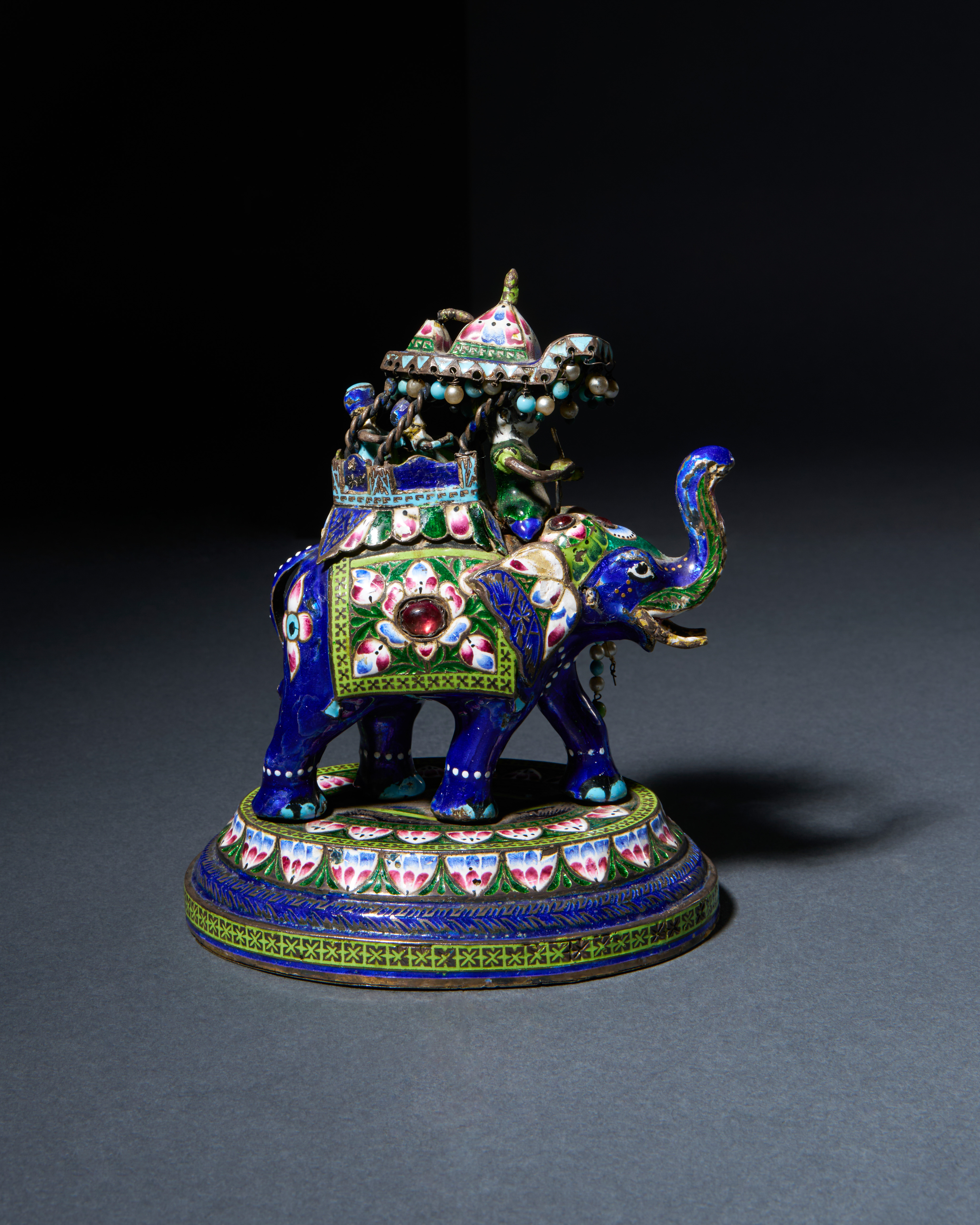AN INDIAN POLYCHROME ENAMELLED SILVER HOWDAH FIGURE, BENARES, INDIA, 20TH CENTURY