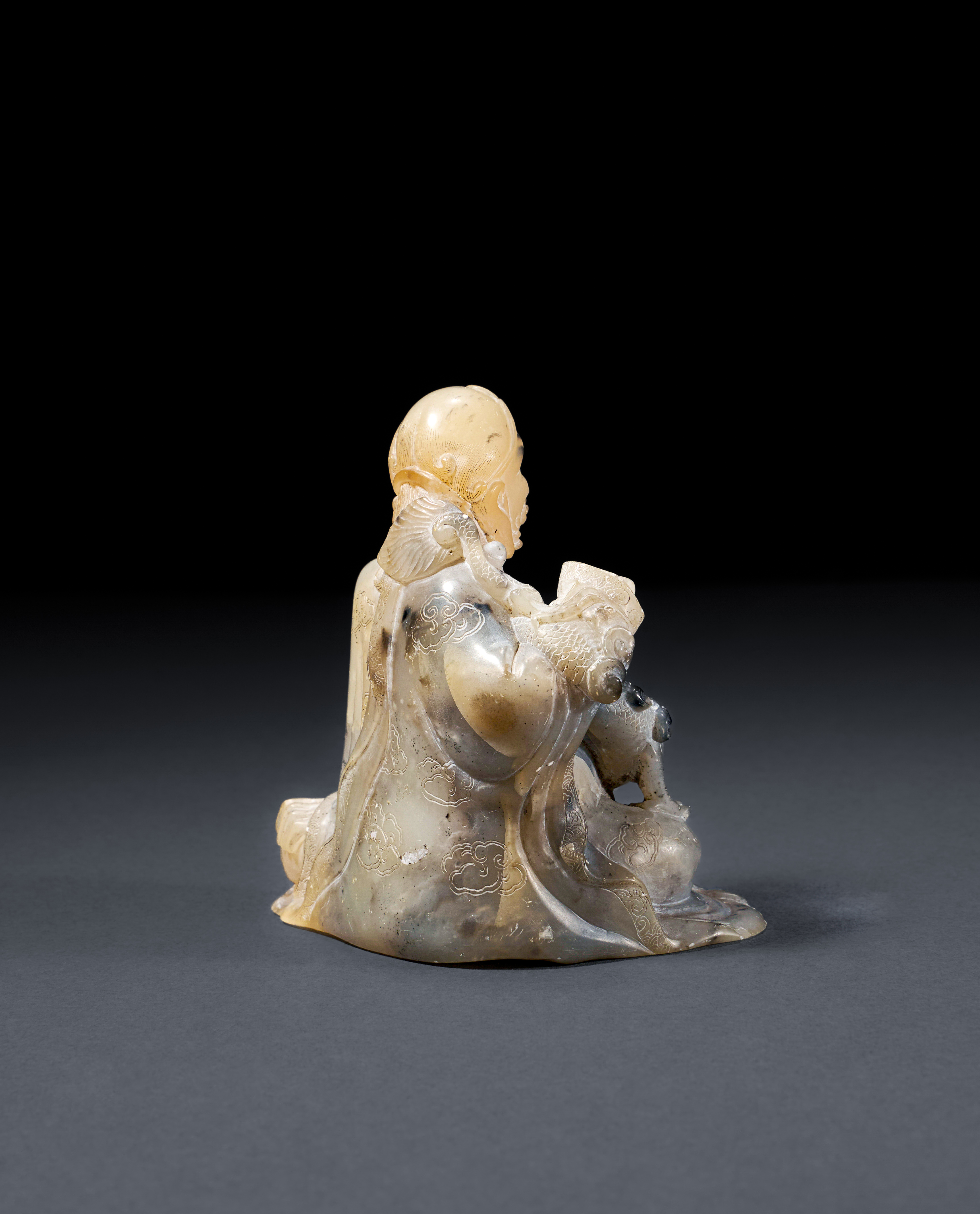 A CARVED SOAPSTONE FIGURE OF A SEATED LUOHAN, 18TH CENTURY - Image 2 of 3