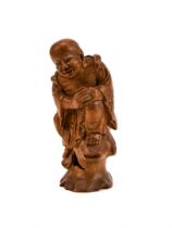 A CHINESE BAMBOO FIGURE OF AN IMMORTAL, 18TH/19TH CENTURY
