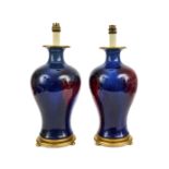 A PAIR OF CHINESE LAVENDER FLAMBE VASES CONVERTED TO LAMPS, 19TH CENTURY