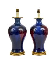 A PAIR OF CHINESE LAVENDER FLAMBE VASES CONVERTED TO LAMPS, 19TH CENTURY