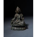 A BRONZE BUDDHA