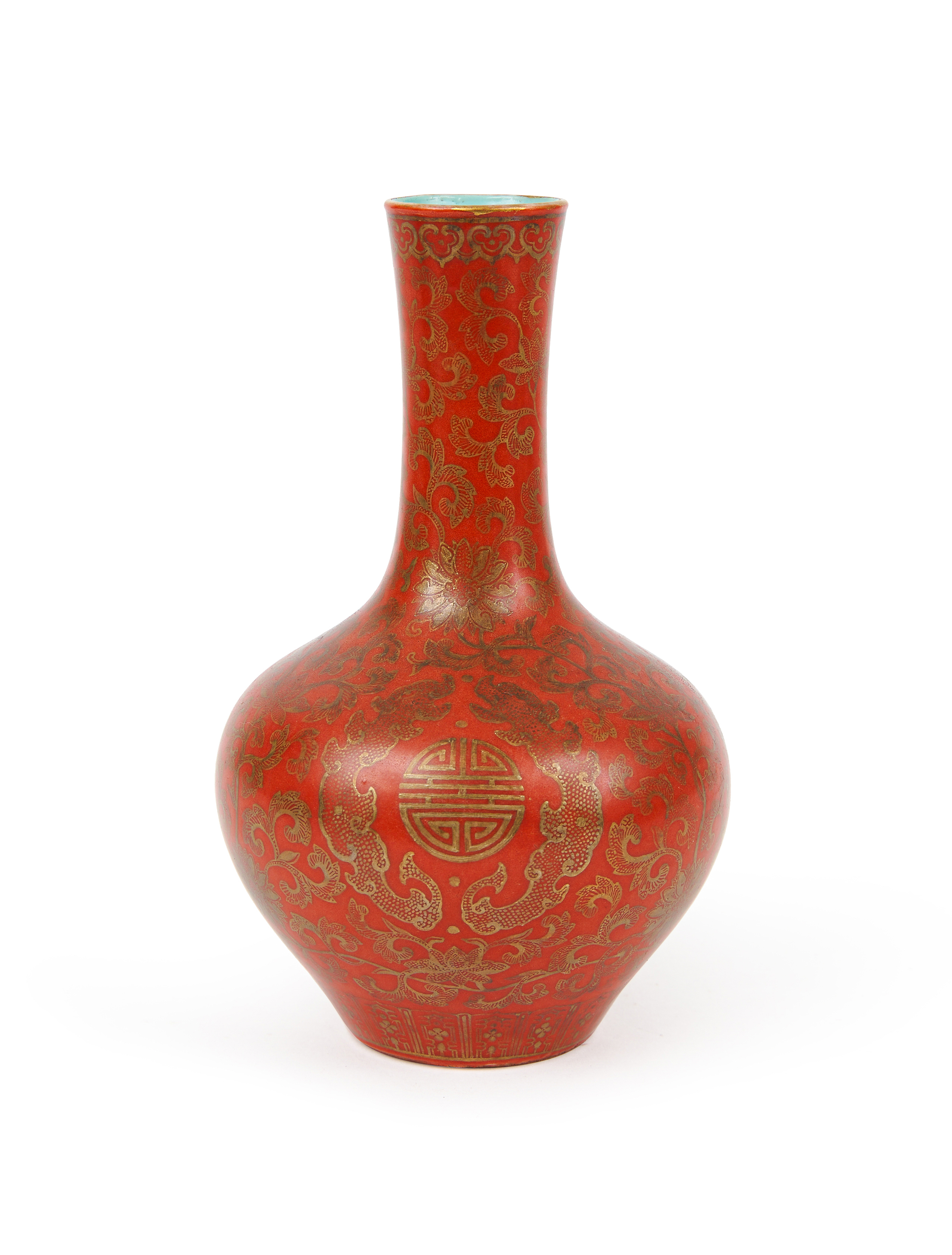 A GILT-DECORATED CORAL-GROUND BOTTLE VASE, QING DYNASTY (1644-1911)