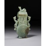 A MING STYLE CELADON JADE MYTHICAL BEAST VASE, QING DYNASTY (1644-1911)