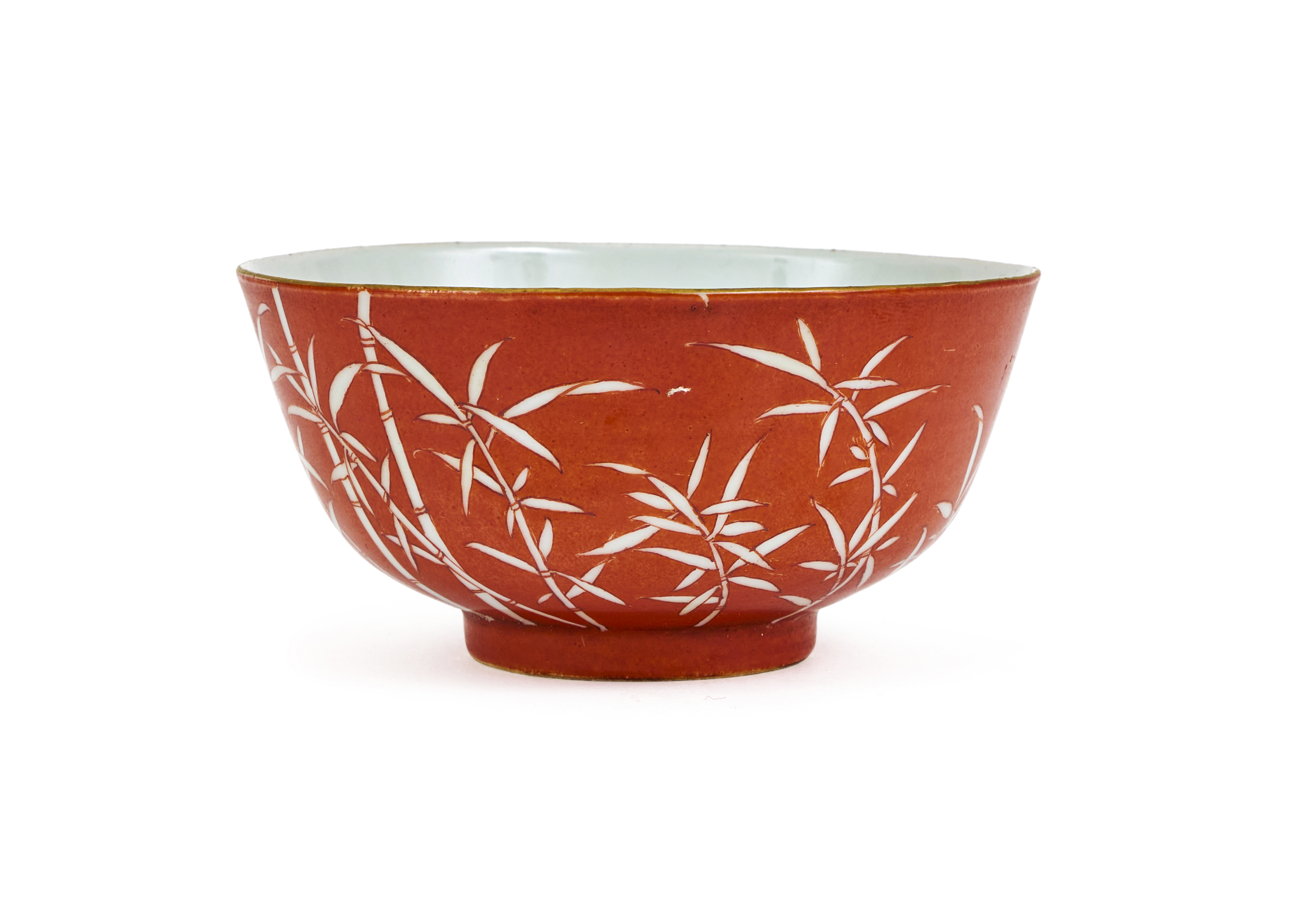 A CHINESE IRON-RED REVERSE-DECORATED BOWL PROBABLY 20TH CENTURY