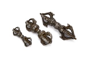 THREE TIBETAN WHITE METAL VAJRA'S