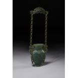 A CHINESE SPINACH GREEN JADE CHAIN VASE, 19TH CENTURY