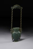A CHINESE SPINACH GREEN JADE CHAIN VASE, 19TH CENTURY