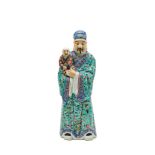 A LARGE CHINESE FAMILLE ROSE FIGURE OF AN IMMORTAL, 19TH CENTURY