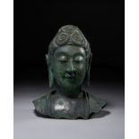 A BRONZE BUDDHA HEAD