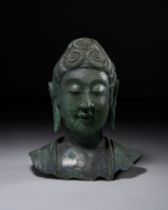 A BRONZE BUDDHA HEAD