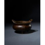 A CHINESE BRONZE TRIPOD CENSER, QING DYNASTY (1644-1911)