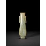 A CHINESE PALE WHITE GREEN AND BROWN-STREAKED JADE VASE, HU, 18TH CENTURY, QIANLONG PERIOD (1736-179