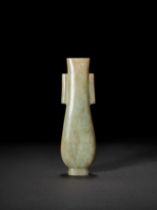 A CHINESE PALE WHITE GREEN AND BROWN-STREAKED JADE VASE, HU, 18TH CENTURY, QIANLONG PERIOD (1736-179