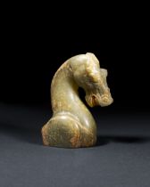 A CHINESE JADE HORSE FIGURE