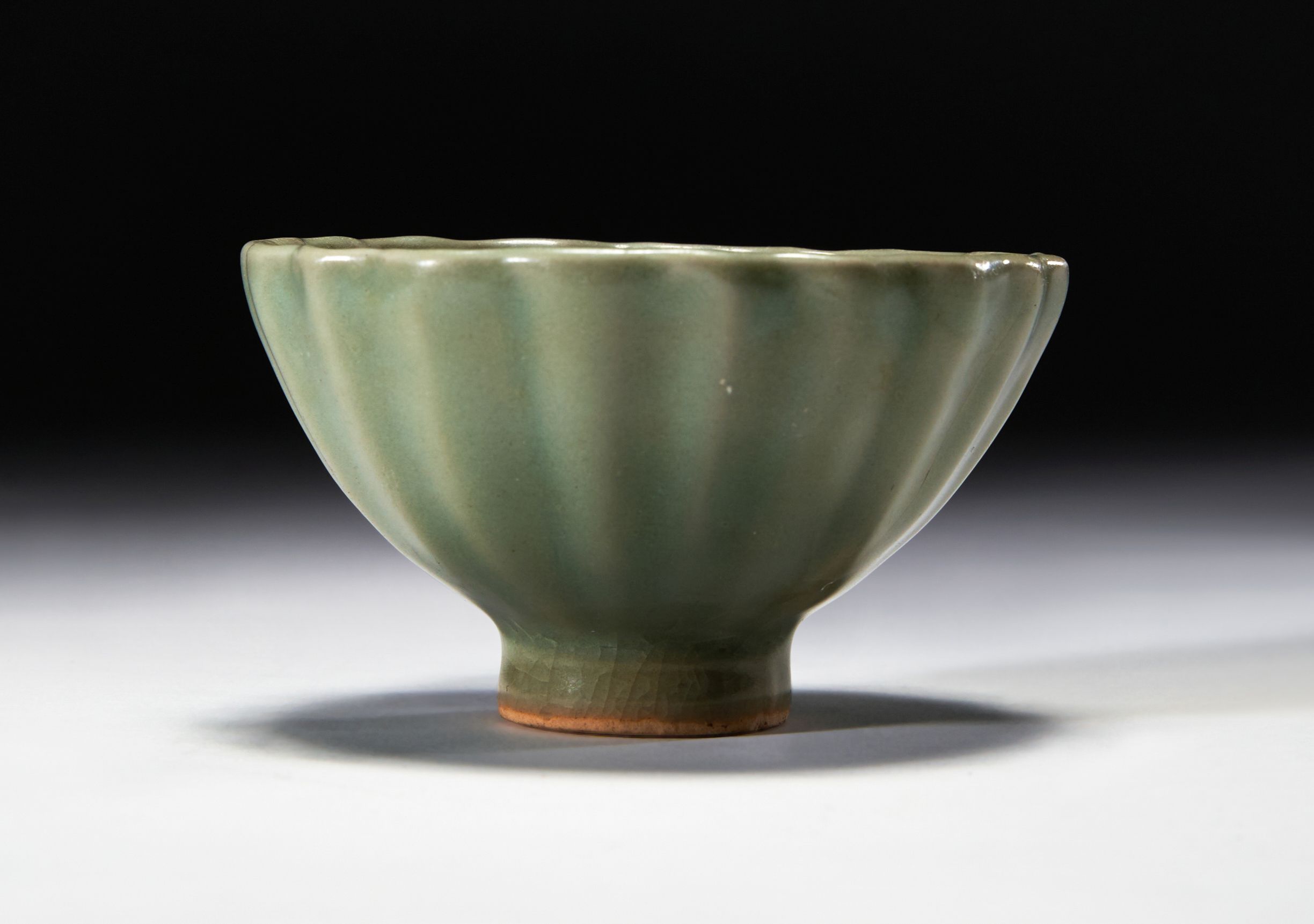 A LONGQUAN CELADON 'LOTUS' BOWL SOUTHERN SONG DYNASTY (1127-1279) OR LATER