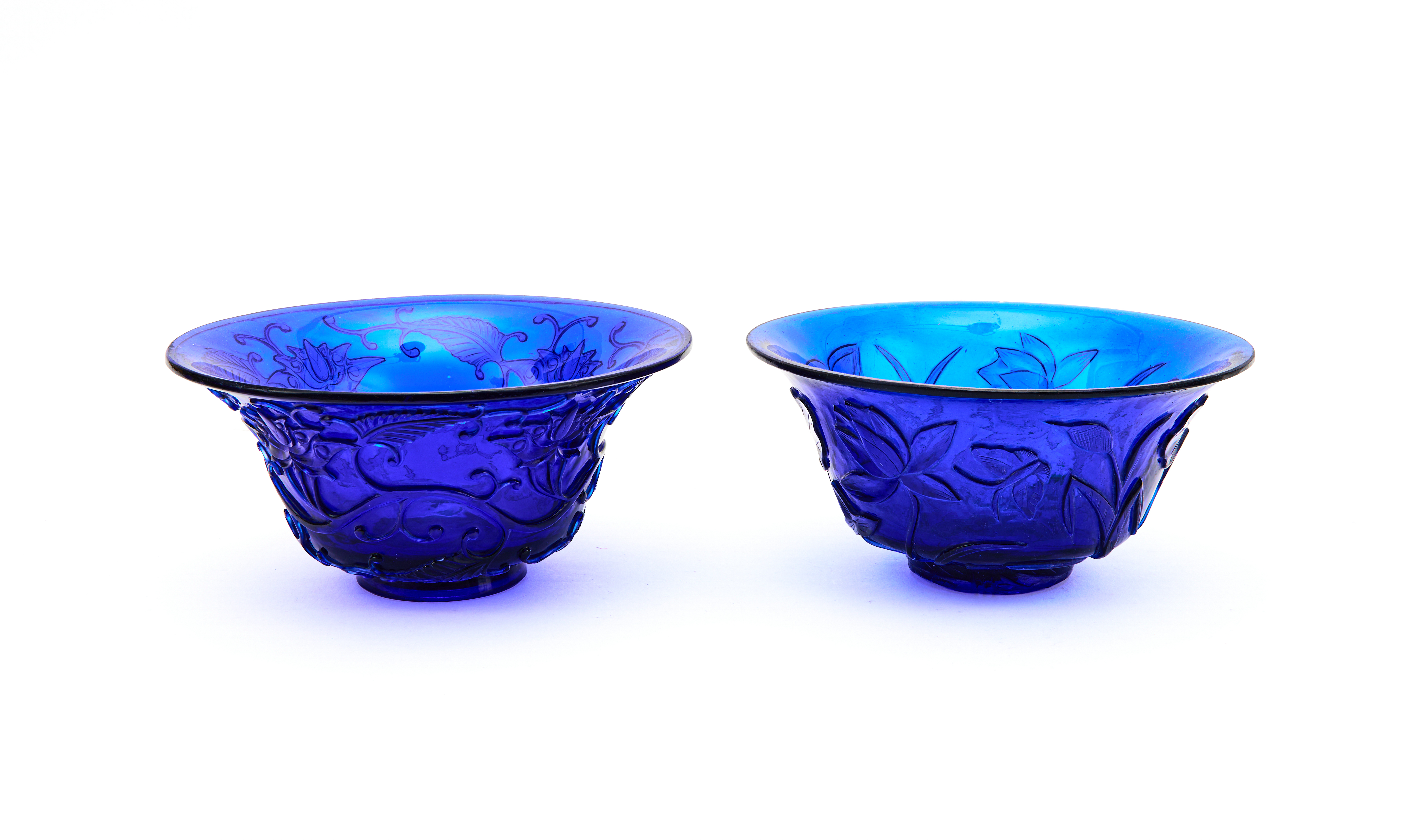 A PAIR OF CARVED BLUE GLASS BOWLS CHINA, QING DYNASTY (1644-1911)