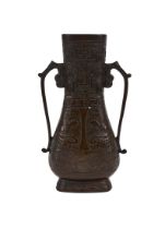 A CHINESE BRONZE BALUSTER VASE, QING DYNASTY (1644-1911)