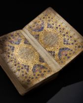 AN ILLUMINATED SAFAVID QUR’AN, 17TH CENTURY COPIED BY MIRZA BAYG MUHAMMAD NUR AL-DIN AL-RAZI, DATED