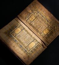 A RARE & EARLY ILLUMINATED 17TH CENTURY OTTOMAN QUR’AN DATED 1082AH/1671AD SIGNED BY AHMAD BIN AHMAD