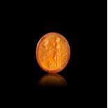 A GREEK INSCRIBED CARNELIAN INTAGLIO OF A MAIDEN HELLENISTIC PERIOD, CIRCA 2ND-1ST CENTURY B.C.