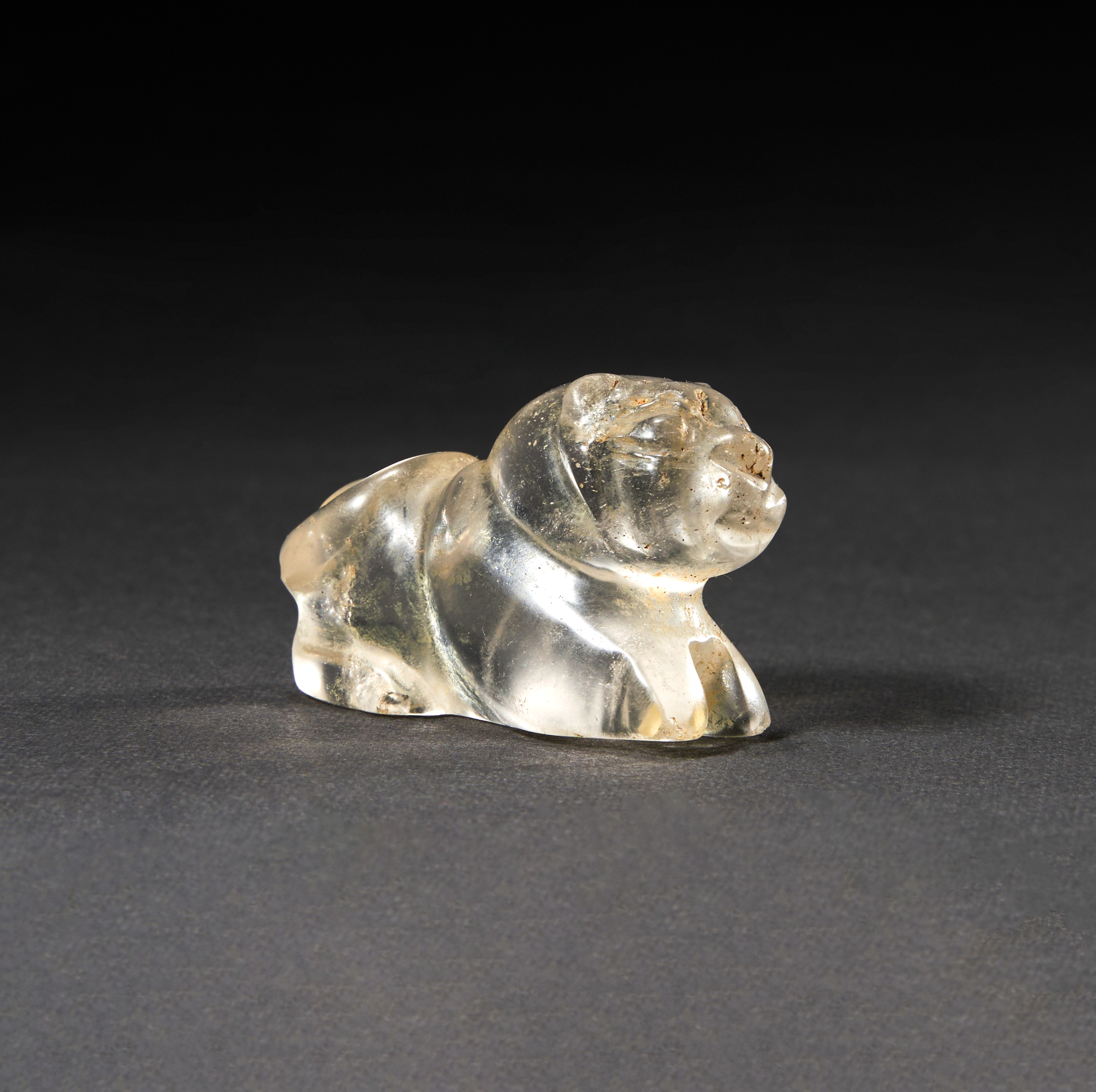 A GREEK ROCK CRYSTAL AMULET OF A RECUMBENT FELINE, CIRCA 5TH CENTURY A.D. OR LATER - Image 2 of 3