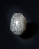 A GRAECO-PERSIAN BLUE CHALCEDONY PYRAMIDAL STAMP SEAL CIRCA LATE 6TH-EARLY 5TH CENTURY B.C.