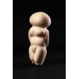 AN ANATOLIAN STONE MOTHER GODDESS NEOLITHIC PERIOD, CIRCA 6TH MILLENNIUM B.C.