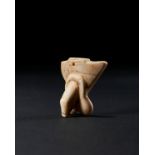 A GRAECO-ROMAN MARBLE PHALLUS PENDANT, CIRCA 3RD-1ST CENTURY B.C.